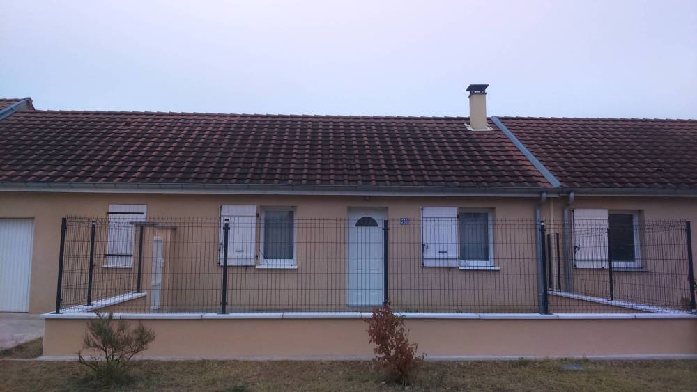 Maçonnerie paysagère maison rouge